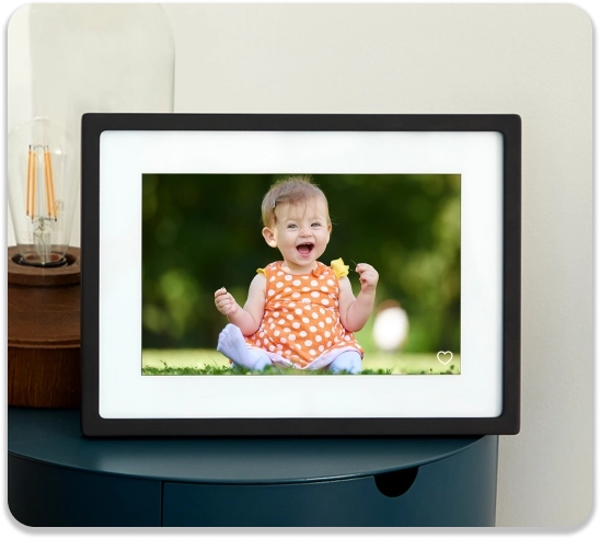 Skylight Frame with smiling girl wearing orange dress with white poka dots